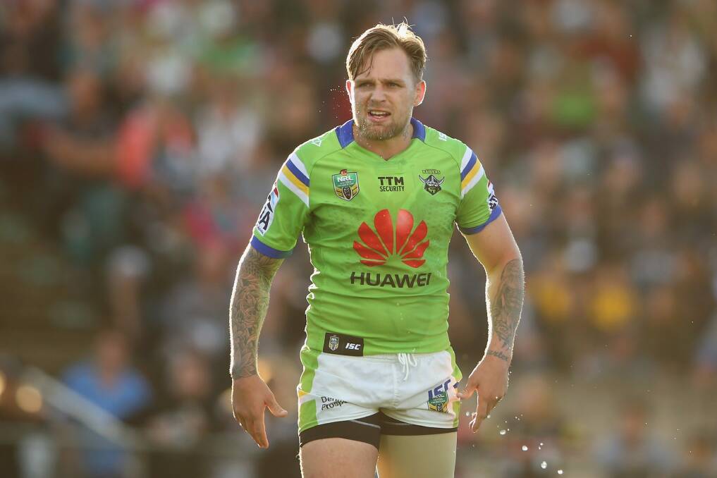 Injured: Canberra Raiders five-eighth Blake Austin was hurt while scoring a solo try in the second half. Photo: Mark Kolbe