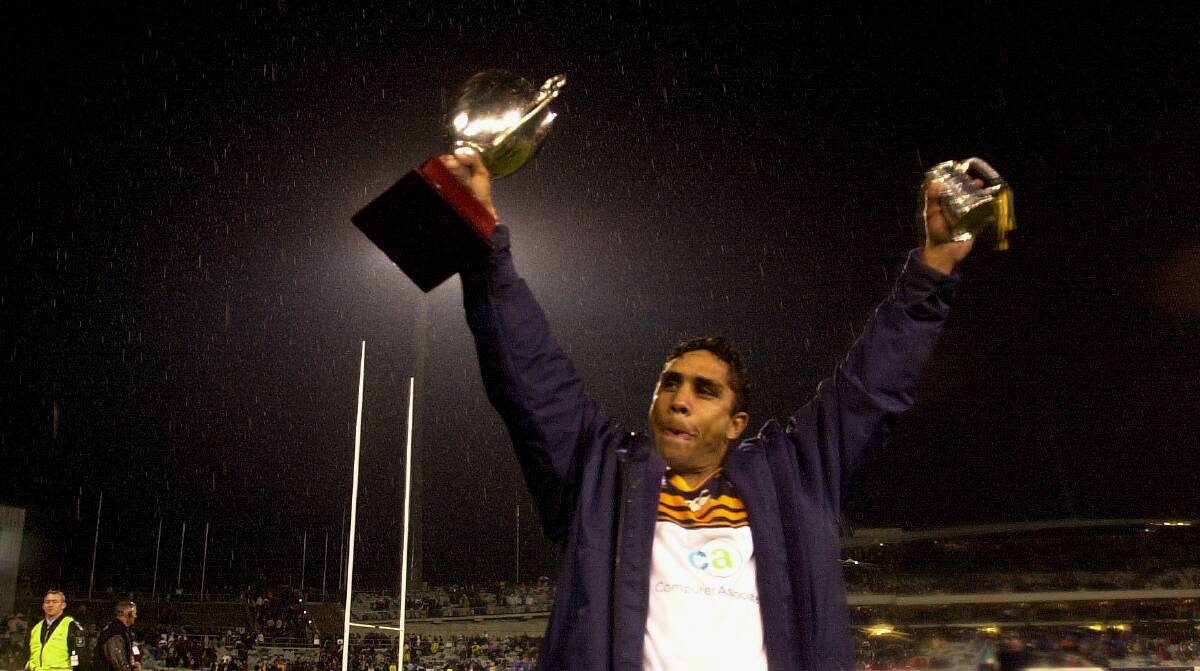 Andrew Walker after the 2001 Super Rugby grand final. Photo: Gary Scahfer