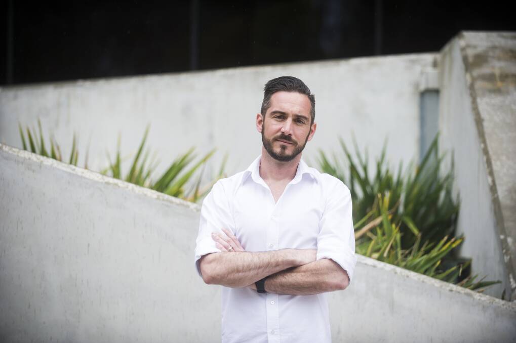 Assistant professor at University of Canberra Eamon Merrick says he and colleagues are burning out, forced to work long nights and weekends to meet unsustainable workloads. Photo: Dion Georgopoulos