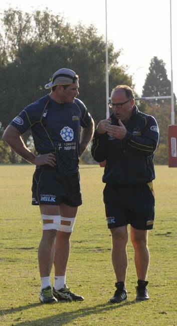 Jake White and Ben Mowen discuss tactics on Friday in Pretoria. Photo: Chris Dutton