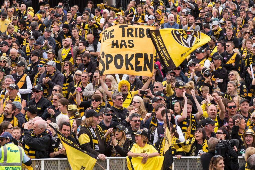 The giant awakens: The crowd cheers on their heroes at Punt Road on Sunday. Photo: Daniel Pockett