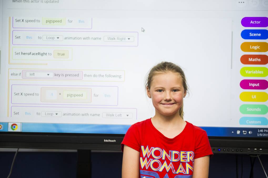 Matilda Bowen keeps busy these school holidays by learning to code. Photo: Dion Georgopoulos