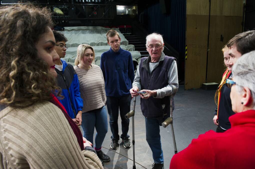 Chris Ellyard teaching a group of uni students lighting design at Theatre 3.  
 Photo: Rohan Thomson