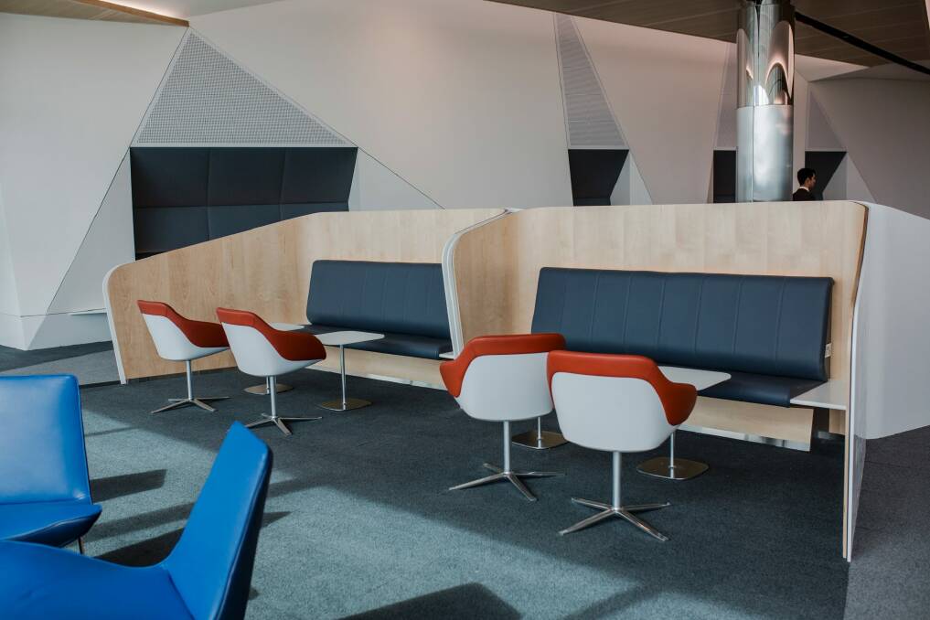Leather seats and wooden booths are featured in Canberra's new international terminal. Photo: Jamila Toderas