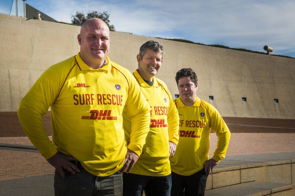 Michael Weyman, Shaun Pike and Andrew Edmunds, who received the Surf Lifesaving Australia national rescue of the month award for March at Parliament House on Thursday. Photo: Elesa Kurtz