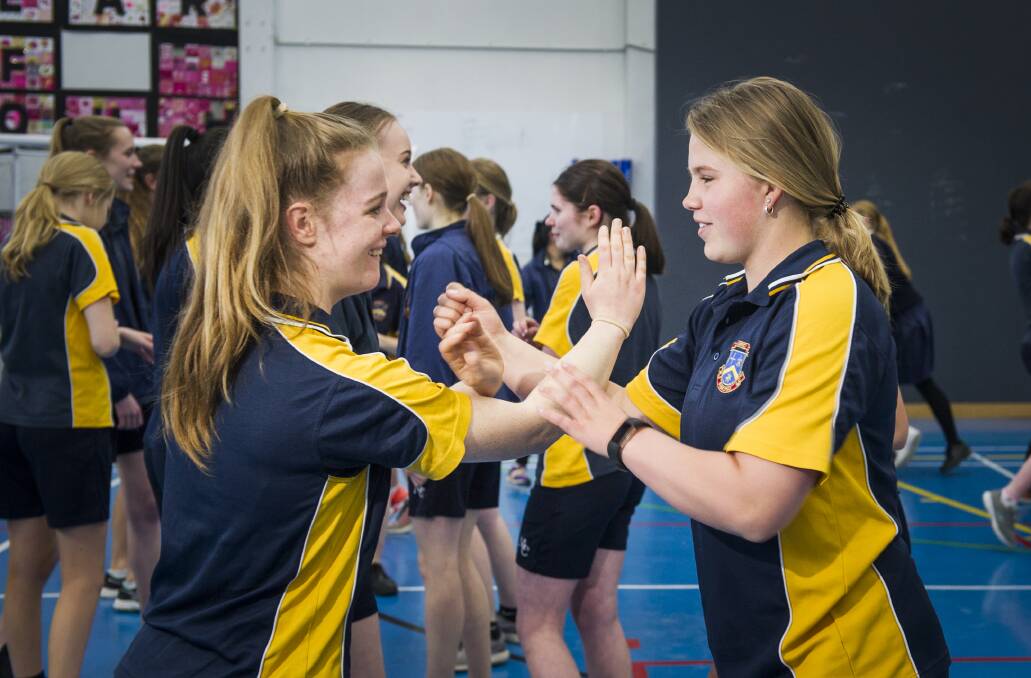 Merici College year 10 students Hayley Browne and Alex Rushton, both 16, who take part in self defence training.  Photo: Photo Elesa Kurtz