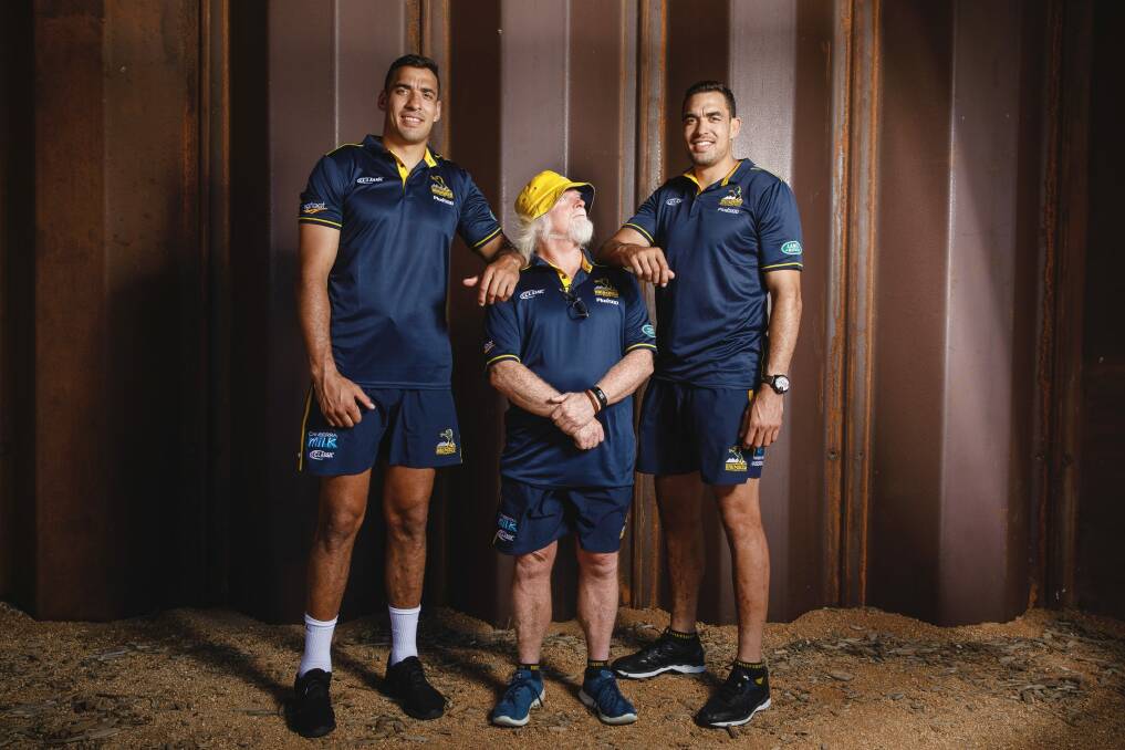 Twin coup: Richie and Rory Arnold with Brumbies forwards coach Laurie Fisher. Photo: Sitthixay Ditthavong