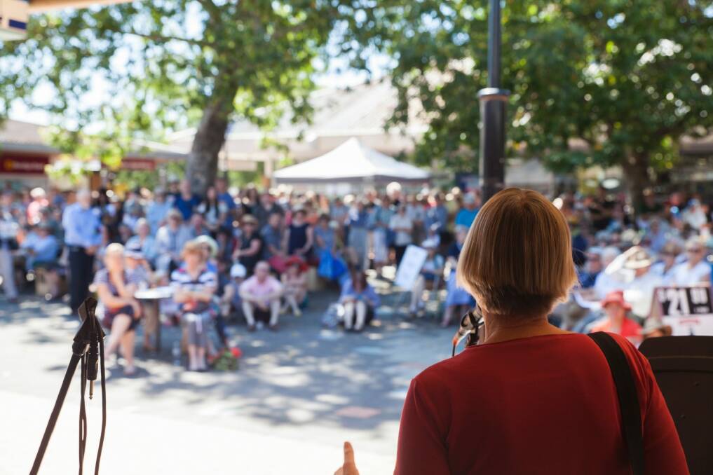 Greens MLA Caroline le Couteur addresses protesters at Curtin 
Square.  Photo: James Hall
