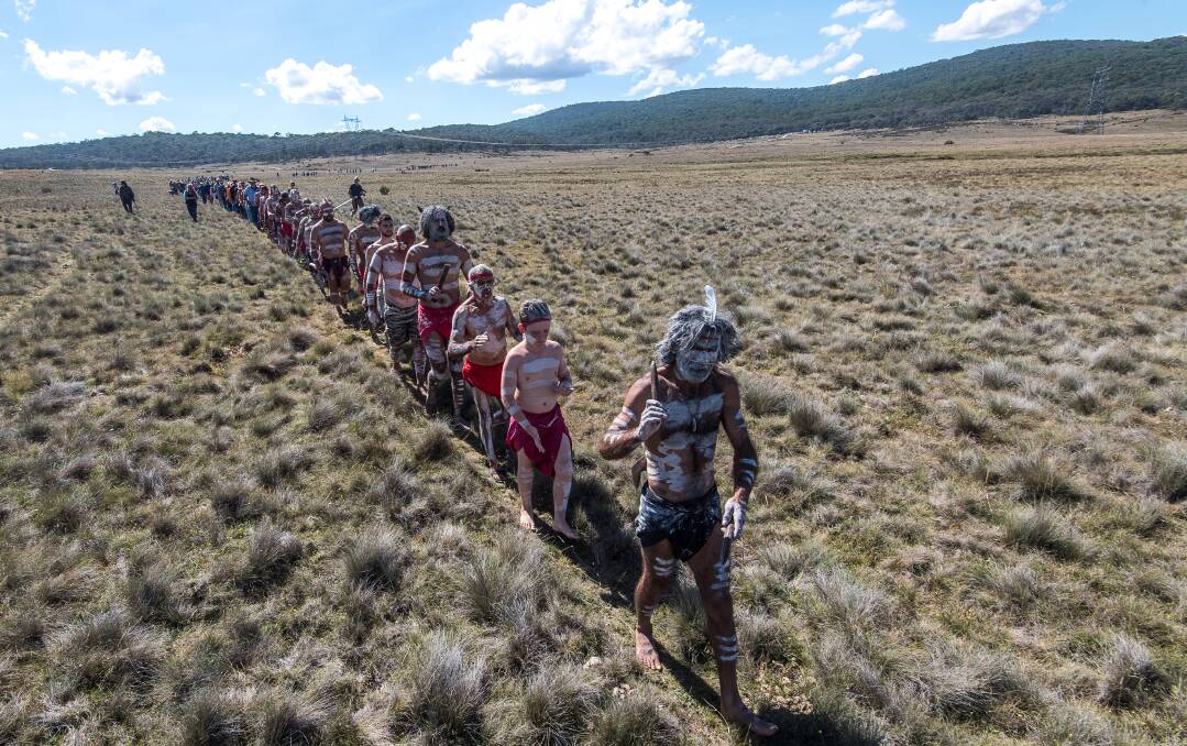 Walking the land: clans on their way to a Narjong ceremony in Kosciuszko National Park. Photo: Justin McManus
