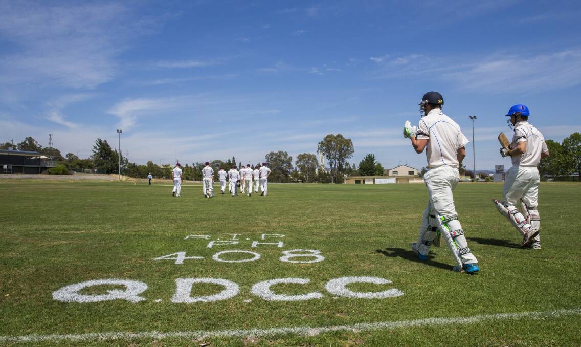 Queanbeyan and Wests/UC cricketers resume play at Freebody Oval and pay tribute to Australian batsman Phillip Hughes. Photo: Matt Bedford