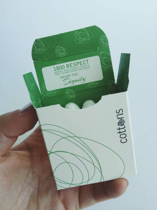 The 1800 RESPECT domestic violence counselling service number has been printed on the inside of Cottons tampon packets in a new initiative. Photo: Supplied