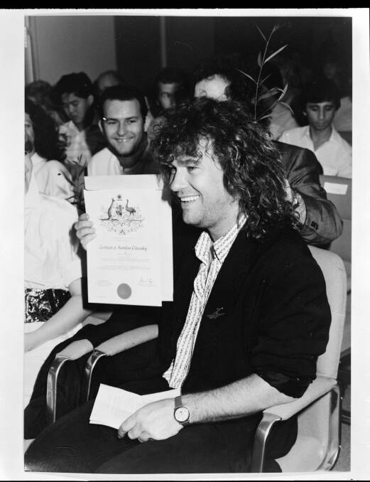 Scottish-born Jimmy Barnes becoming an Australian citizen in 1988. He says Australia gave him opportunities and a happy life and he wants other migrants to share in the country's good fortunes. Photo: Supplied by the National Archive