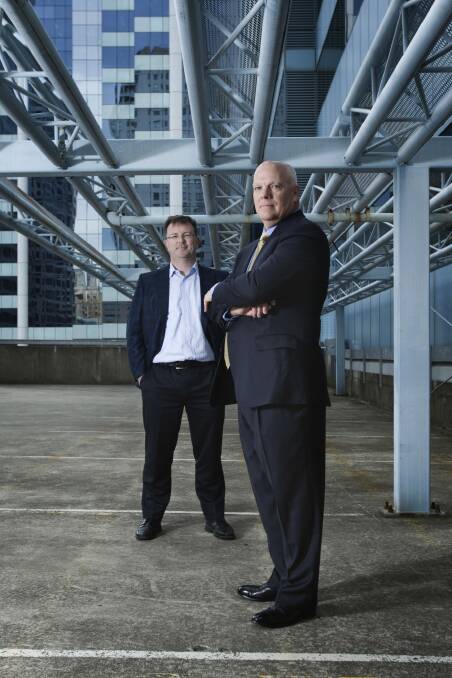 Cyber warriors: Nuix chief executive Eddie Sheehy with former Pentagon investigator Keith Lowry. Photo: Louie Douvis