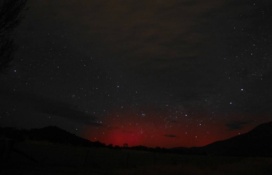 The Aurora Australis above Mt Tennent Tuesday morning. Photo: Ian Williams