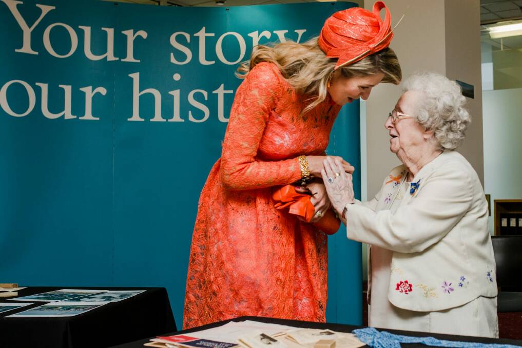 Queen Maxima of the Netherlands met Canberra lace-maker Petronella Wensing, 92, at the National Archives of Australia on Thursday. Mrs Wensing migrated to Australia from Holland in 1953. Her son Ed was born on the first day she spent in Australia. Her daughter, Veronica, stood for the Greens at the ACT election. Photo: Jamila Toderas