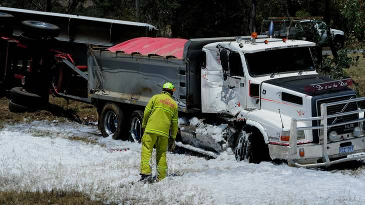 ACT Fire and Rescue attend a collision involving two trucks on the Monaro Highway. Photo: Melissa Adams