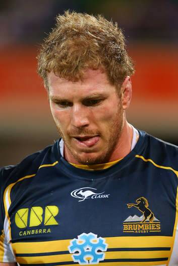 David Pocock of the Brumbies walks from the field after sustaining a knee injury. Photo: Getty