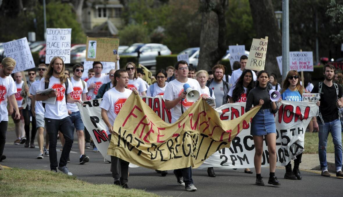Student protesters slam the government's proposed higher education reforms at the ANU Wednesday afternoon. Photo: Graham Tidy