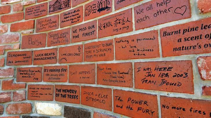 A close-up of bricks from the memorial wall at Mount Stromlo. Photo: Graham Tidy