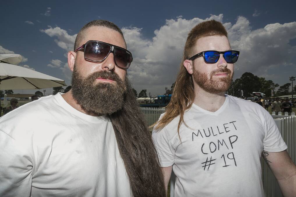 Bonded by mullets were Adam Bezzina from Blacktown in Sydney and James Barraclough from Griffith.  Photo: Sitthixay Ditthavong