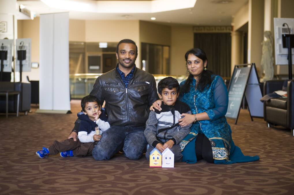Ranjit Kotagiri and Radhika Irukulla with their children Vishwath and Havish are one of the first people to choose a block of land in the newly-released allocations. Photo: Dion Georgopoulos