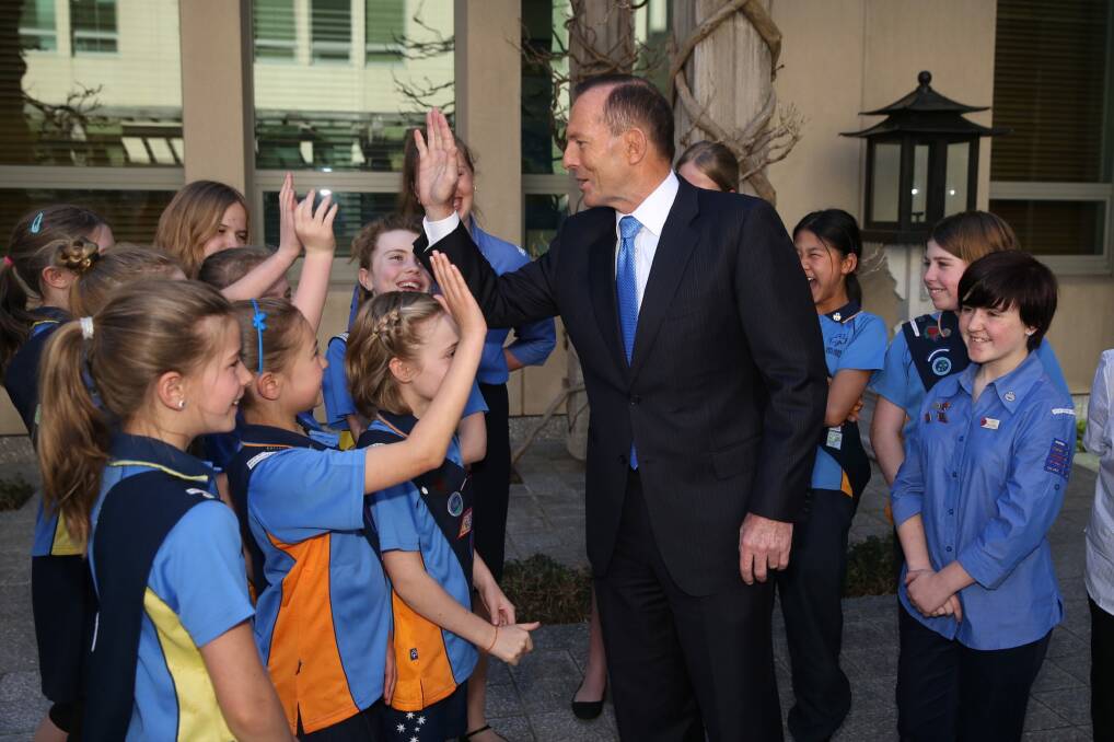 Prime Minister Tony Abbott with Girl Guides at Parliament House in Canberra on Monday September 14, 2015. Photo: Andrew Meares