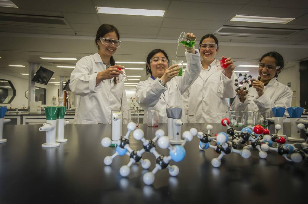 Lyneham High year 10 student Claire Yung, Canberra High year 10 student Vy Dinh, Gold Creek School year 9 student Caitlin Gare and Gungahlin College year 10 student Sayalee Surve will participate in Curious Minds, a program encouraging women to pursue science, technology, engineering and maths. Photo: Karleen Minney