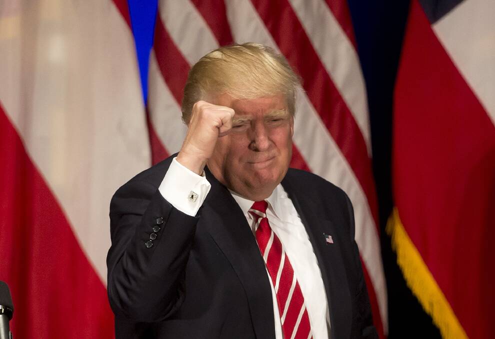 Republican presidential candidate Donald Trump pumping fist. Photo: AP