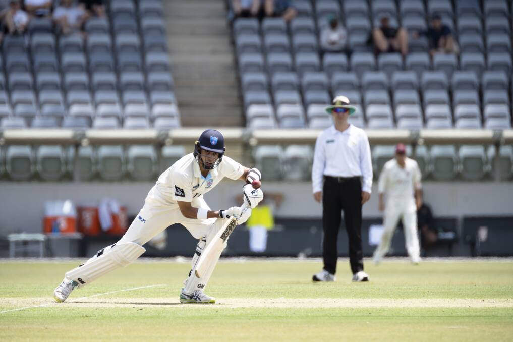 Jason Sangha in action for NSW during the Sheffield Shield match against Qld at Manuka Oval on Friday. Photo: Lawrence Atkin