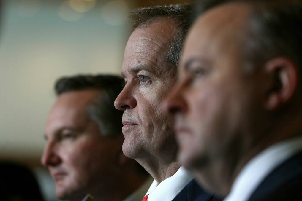 Opposition Leader Bill Shorten, pictured with shadow treasurer Chris Bowen and transport and infrastructure spokesman Anthony Albanese, has vowed to fight any early election on "Labor's turf".  Photo: Alex Ellinghausen