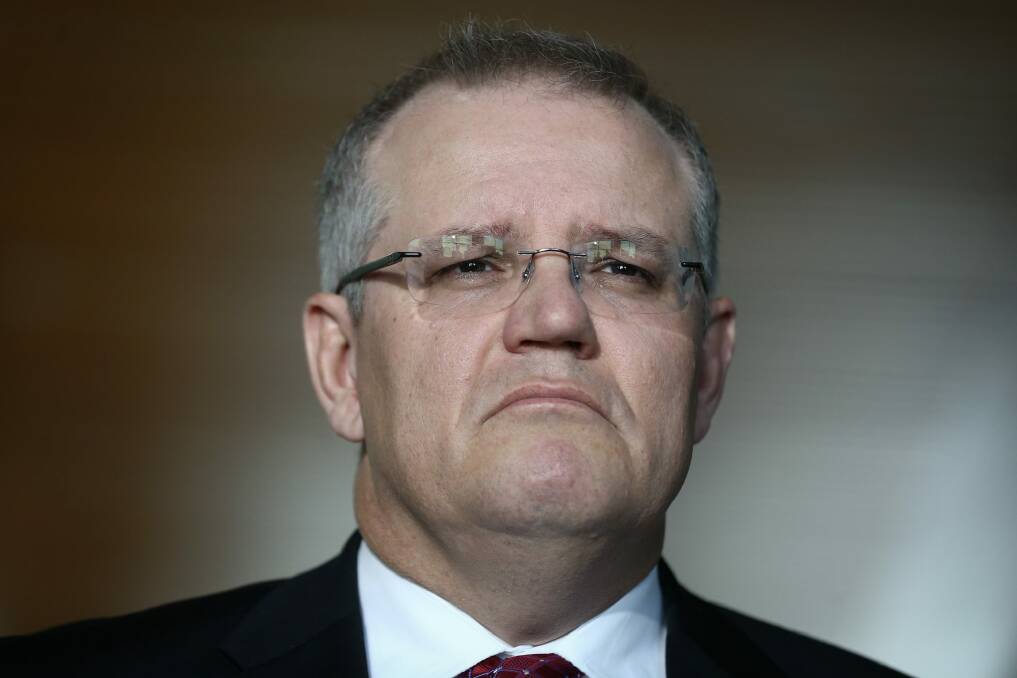 Treasurer Scott Morrison says the government is committed shutting down tax avoidance strategies used by multinationals. Photo: Alex Ellinghausen
