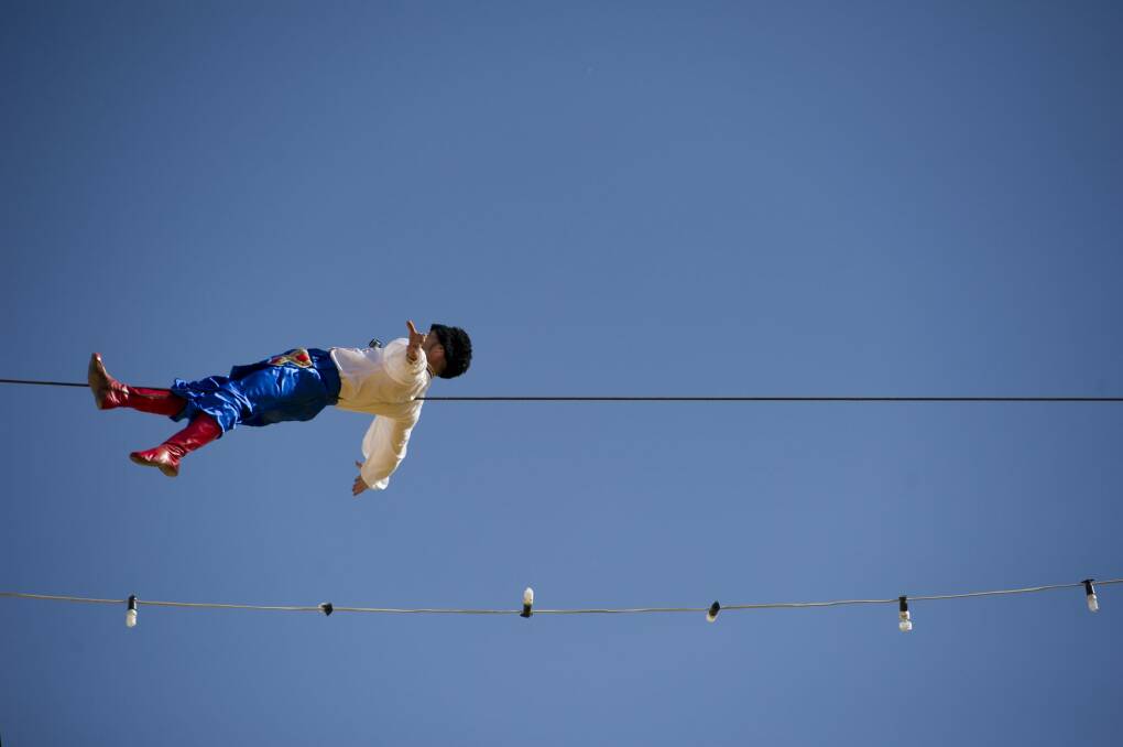 The Great Brokovski aka Ashley Brophy of the The Moscow Circus  walking the tightrope between peaks of the big top. 
The Canberra Times
Date: 05 April 2016
Photo Jay Cronan Photo: Jay Cronan
