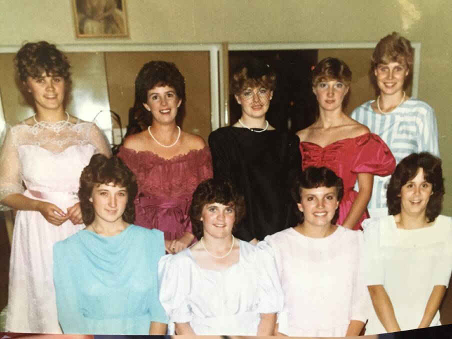 Karen Hardy, second from left, front row, attends her year 12 formal in 1984. Photo: Supplied