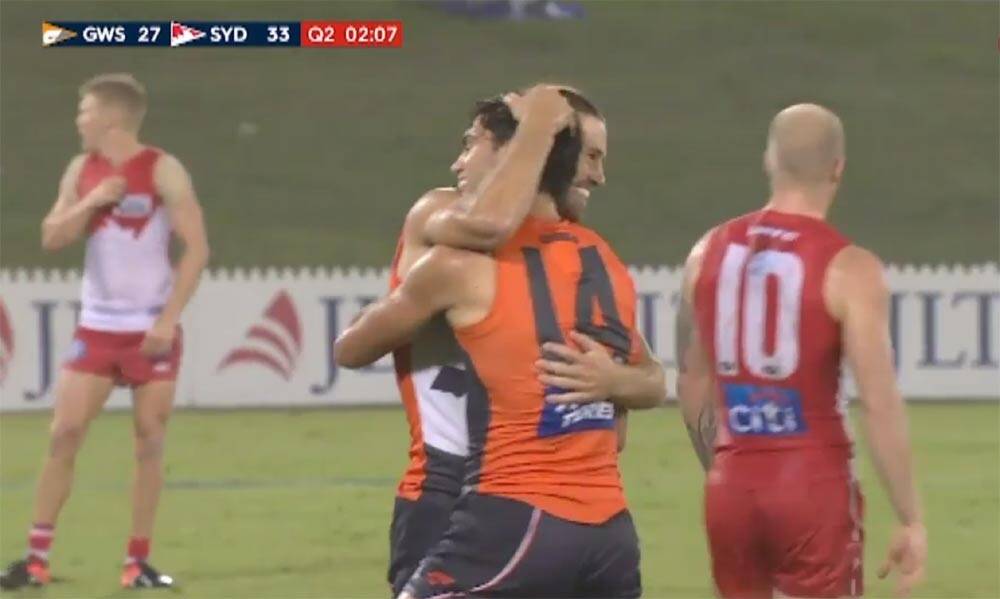 Teammates rushed to celebrate with Taranto after he returned to the field and kicked a gutsy goal. Photo: Fox