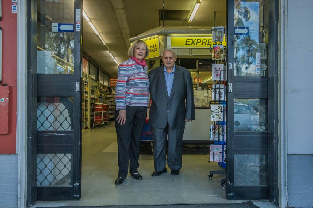 Olympia and Chris  Maleganeas officially sold the Red Hill supermarket on July 10. Photo: Karleen Minney