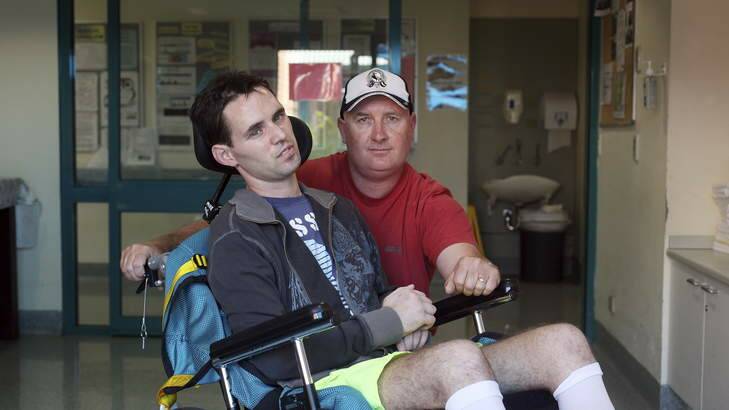 Matt Pridham with his father David in the Brains Injury Unit at Liverpool Hospital in Sydney. Photo: Fiona Morris