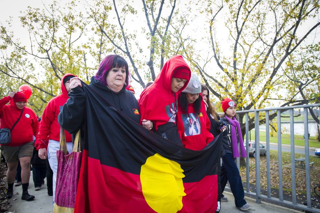 Steven Freeman's mother Narelle King with family members and Julie Tongs, leading the 2017 Canberra National Sorry Day March. Photo: Dion Georgopoulos