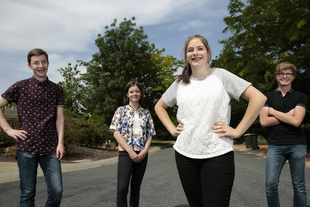 Rosie Cooper (front) 15, and her friends Robert Wilson, 15, Lucy Vandergugten, 15, and Callum Innis, 15, are positive about their futures and feel their career goals are attainable. Photo: Jeffrey Chan