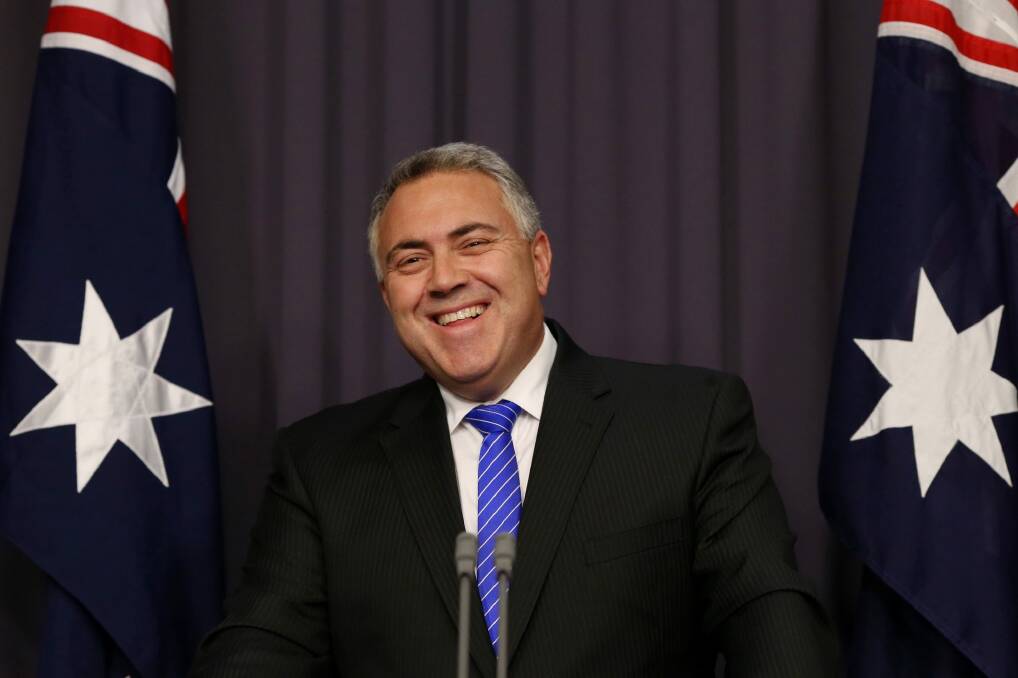 Treasurer Joe Hockey wants tax officials to travel the world, convincing international online retailers to collect GST. Photo: Andrew Meares