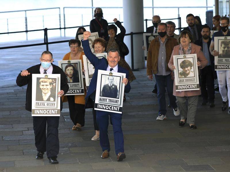 Ballymurphy families applauded after a coroner said 10 people killed in 1971 were innocent.