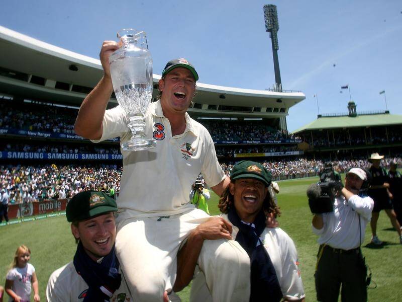 The great Shane Warne being carried round the SCG with the Ashes trophy in 2007.