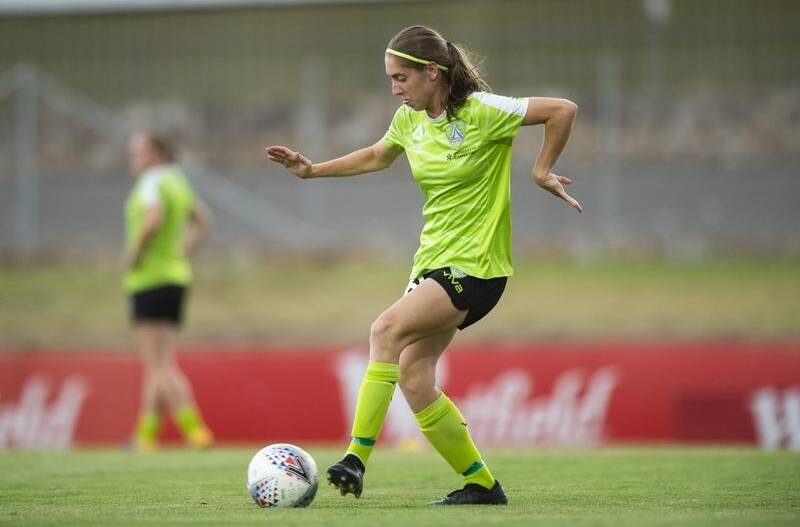 Annalee Grove will join fellow Young Matilda Karly Roestbakken, pictured, at Canberra United.