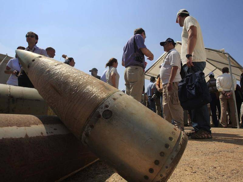Cluster munitions typically release large numbers of bomblets that can kill indiscriminately. (AP PHOTO)