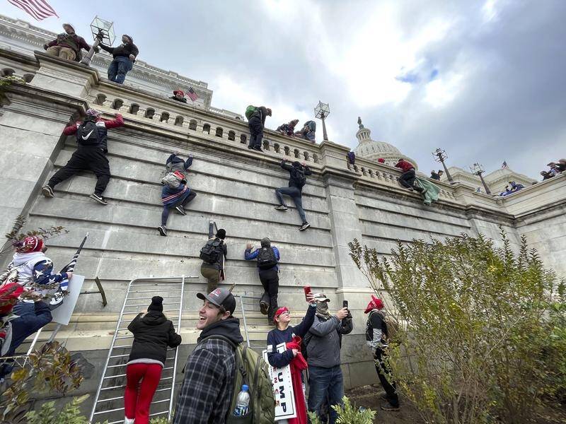 Nine people linked to the Oath Keepers have been charged over the storming of the Capitol.
