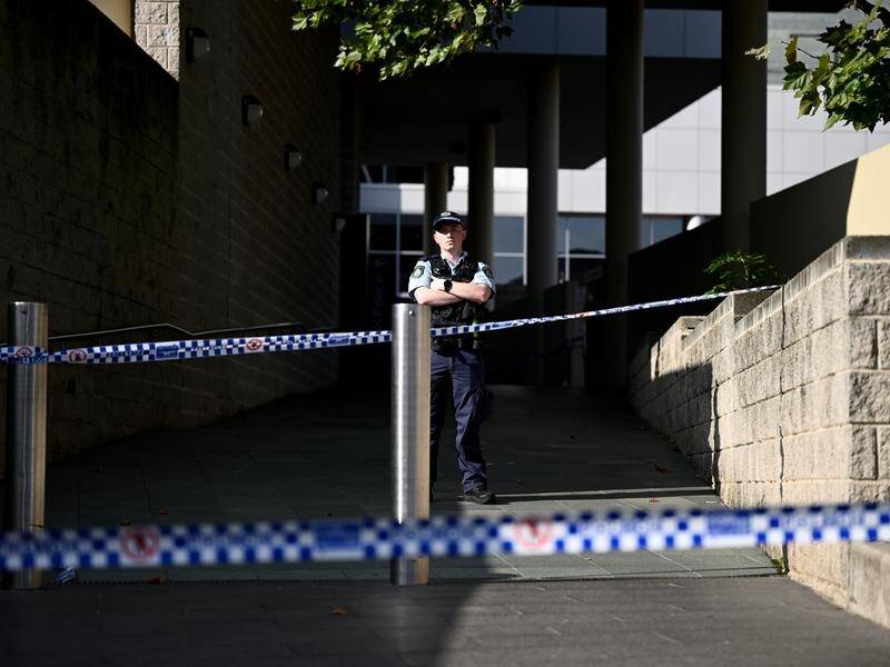 Auburn Police Station in Sydney has been cordoned off as officers investigate a fatal shooting. (Dan Himbrechts/AAP PHOTOS)