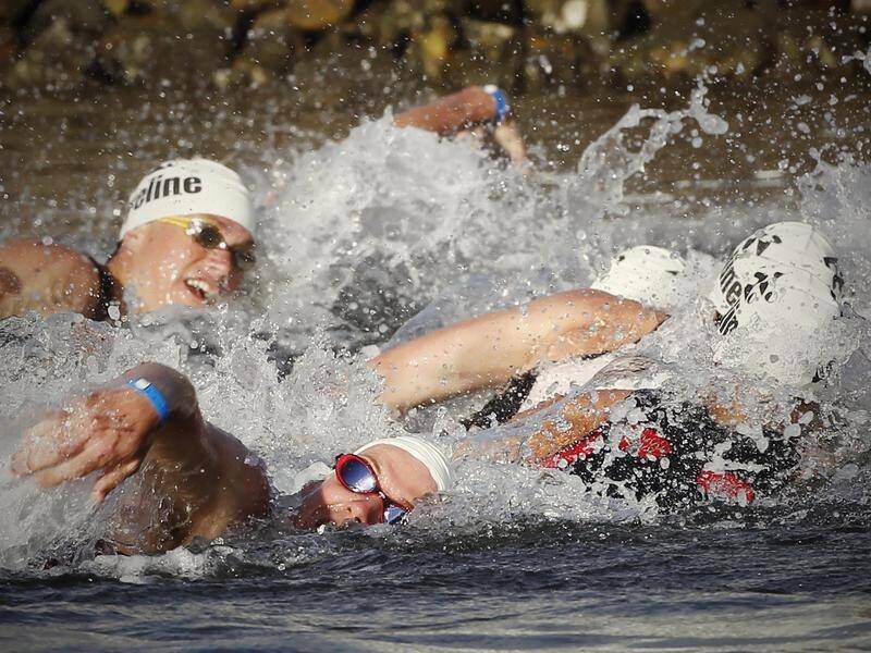A man has died while competing in Sunday's 40th anniversary Noosa triathlon. (Patrick Hamilton/AAP PHOTOS)