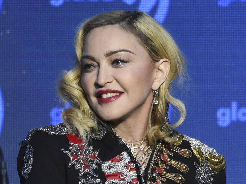Pop queen Madonna has opened her tour with a call to thousands of adoring fans for "light and love". (AP PHOTO)