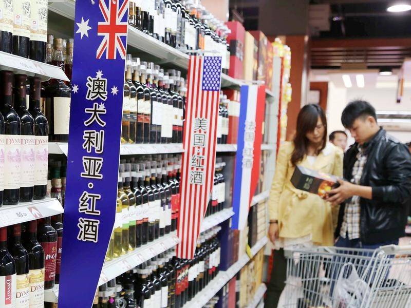 China will look into whether Australia is drowning out local wine producers with cheap products.