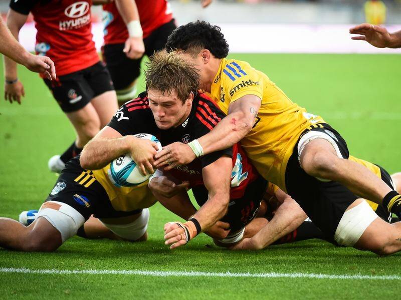 Ethan Blackadder scores a crucial try for the Crusaders in a controversial win over the Hurricanes.
