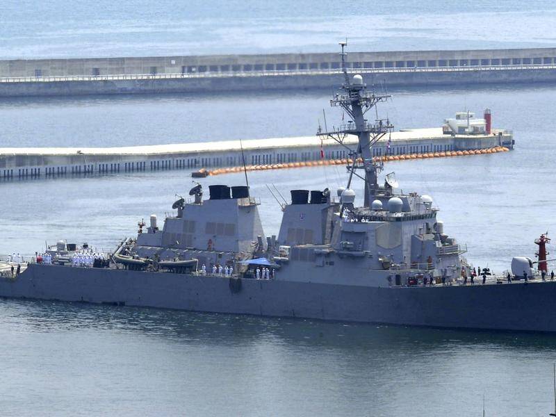 China has objected after the missile destroyer the USS Curtis Wilbur sailed near contested islands.